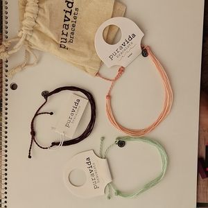 2 Pura Vida bracelets and 1 anklet